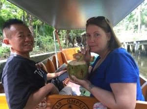 Enjoying a fresh beverage while sailing down the river. 